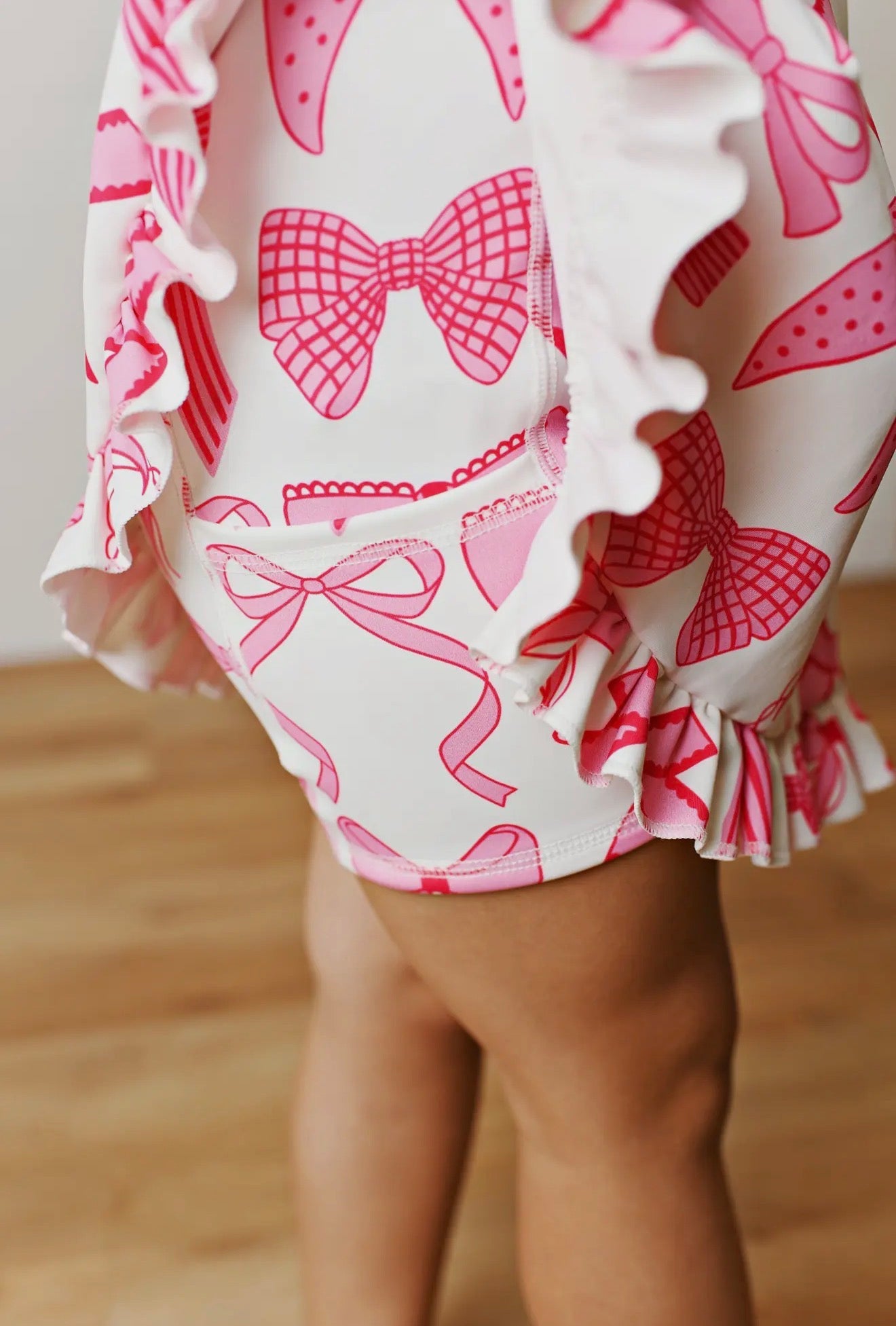 Oopsie Daisy White & Pink Bow Sport Ruffle Dress